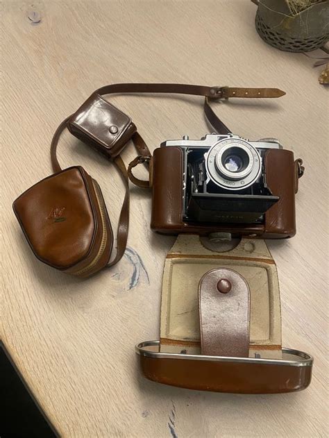 Fotoapparat Zeiss Ikon Nettar mit Blitz und Zubehör Kaufen auf Ricardo