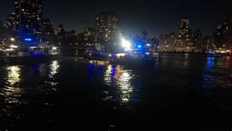 Helicopter Crashes Into New York Citys East River Two Dead As Rescue