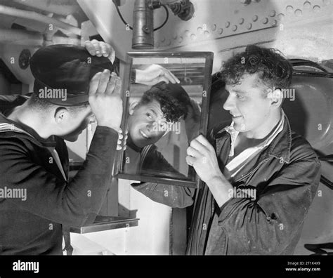 Two Sailors On Hms Anson Smartening Up Ready For The Liberty Boat To