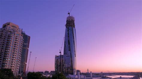 Free stock video - Tall skyscraper under construction at sunset