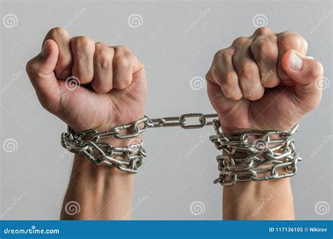 The Prisoner`s Hands Are Bound In Metal Chains Stock Image Image Of