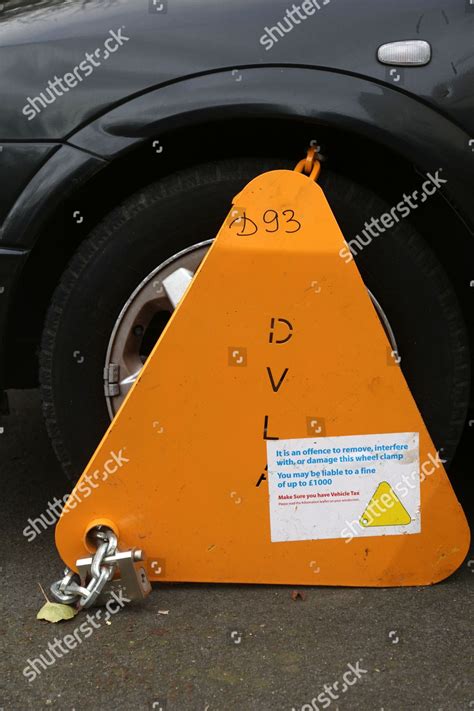 Dvla Wheel Clamp On Untaxed Vehicle Editorial Stock Photo Stock Image