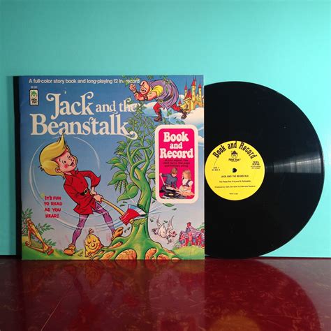 An Old Record With The Title Jack And The Beanstalk On It Next To A Vinyl Album