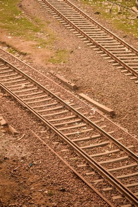 View Of Train Railway Tracks From The Middle During Daytime At