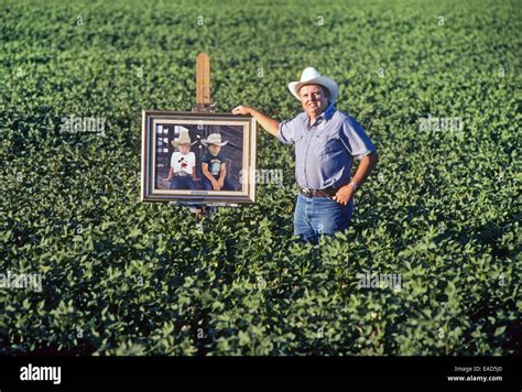 Agricultural Artist Carl Clapp With One Of His Ag Art Paintings In The