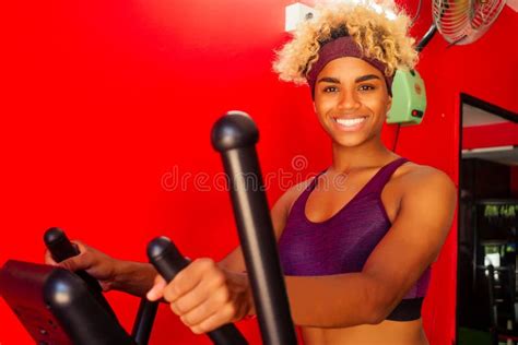 African American Woman Cardio Slimming Aerobics Training On Bicycle