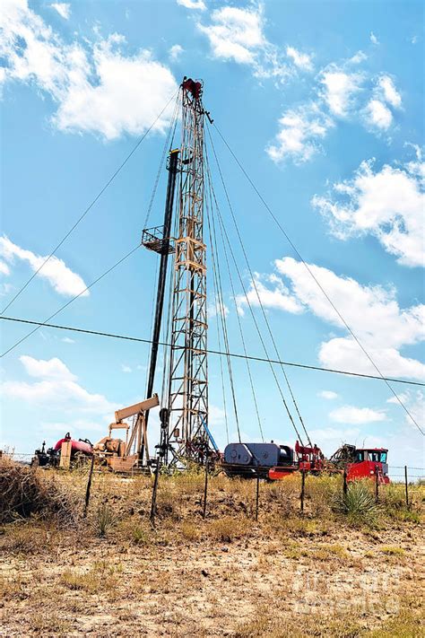 Small drilling Oil Rig in West Texas. Photograph by W Scott McGill - Fine Art America