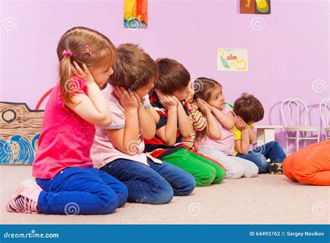 Group Of Kids In Kindergarten Pretend To Sleep Stock Photo Image Of