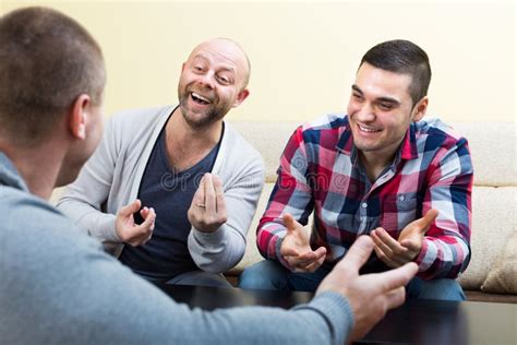 Three Male Friends Talking At Home Stock Photo Image 60762452