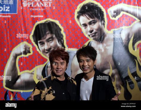 Hong Kong Singers Alan Tam Left And Hacken Lee Pose During A Press