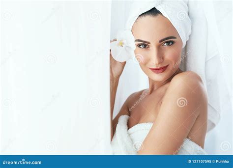 Body Skin Care Beautiful Woman In Towel With Flower In Spa Salo Stock