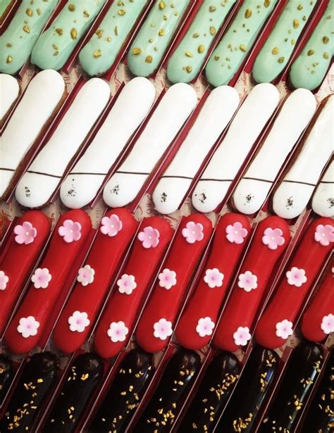 Many Different Colored Toothbrushes Lined Up Together