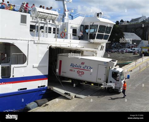 Belle-Íle-en-Mer: unloading ferry on Le Palais waterfront Stock Photo - Alamy