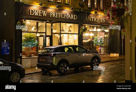 Drew Pritchard Antiques, High Street, Conwy, pictured in December 2021 Stock Photo - Alamy