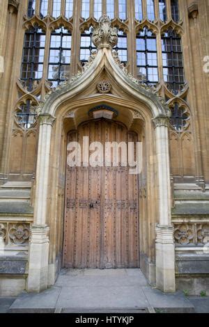 Decorative wooden doors to the Divinity College Oxford Stock Photo - Alamy