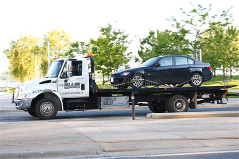 Car being towed stock photo. Image of truck, buildings - 20612994