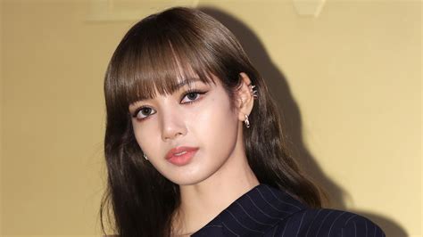 K-Pop Star Lisa of Blackpink Teased Solo Debut With Ultra-Long Braided Pigtails | Photo | Allure