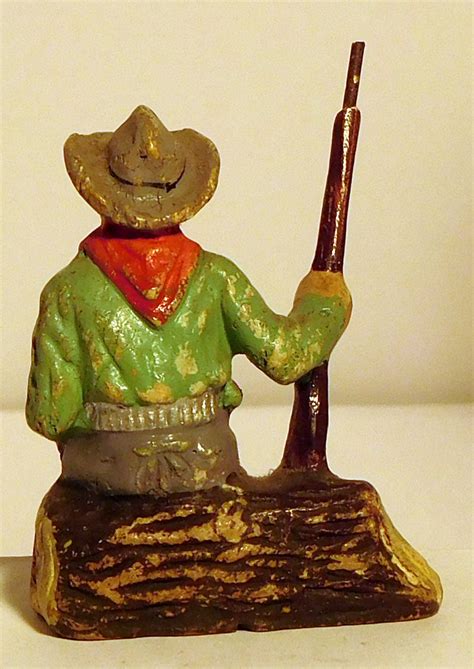 Durso Cowboy Sitzend Mit Gewehr Germantoys De