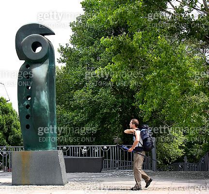 Pilgrim Backpacker Walking By Homenaje Al Peregrino Sculpture Sarria