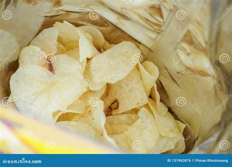 Potato Chips In Open Snack Bag Closeup Stock Photo Image Of Chips