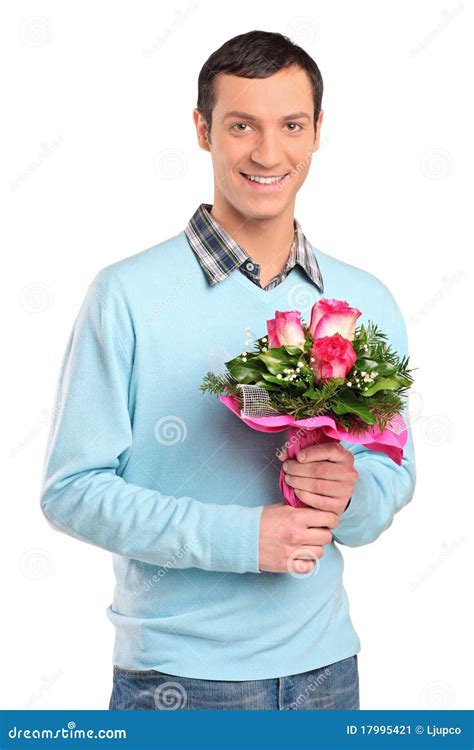 Young Smiling Man Holding A Bouquet Of Flowers Stock Image Image