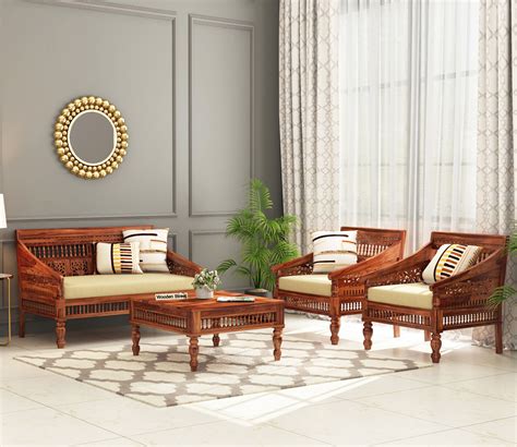 Buy Alanis Wooden Sofa Chair (Honey Finish) at 26% OFF Online | Wooden Street