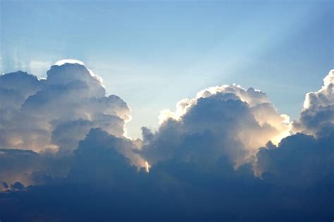 Premium Photo Beautiful Light Of The Sun And Clouds In The Blue Sky