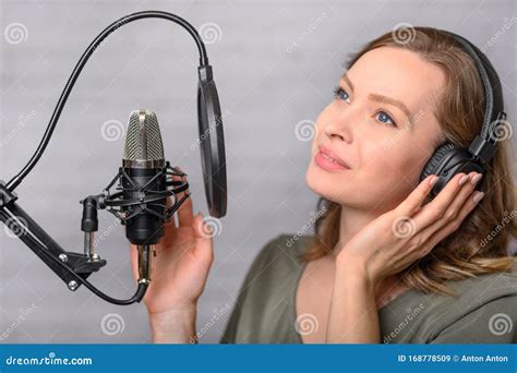 Radio Host On The Radio Working In The Studio Reading News Stock