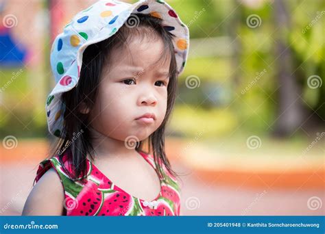 Portrait Adorable Asian Girl Shows A Suspicious Expression Little Kid