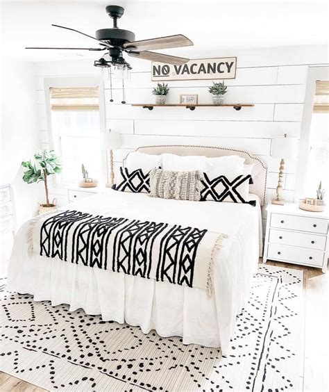 White Shiplap Wall And A White Rug Under A Bed Soul Lane