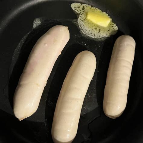 Cooking French White Sausages Boudin Blanc