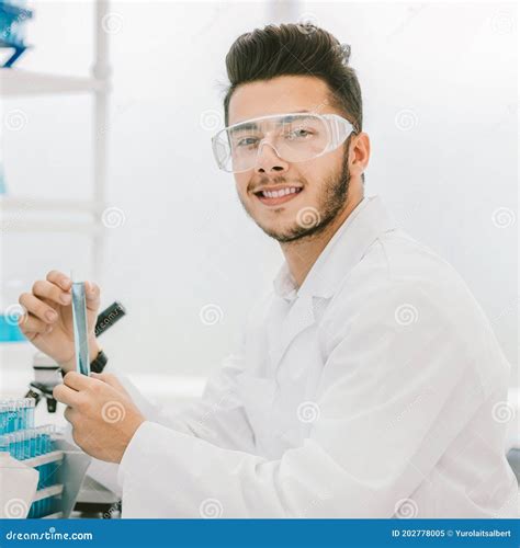 Workplace Of Laboratory With Blood Tubes Samples And Requisition Form