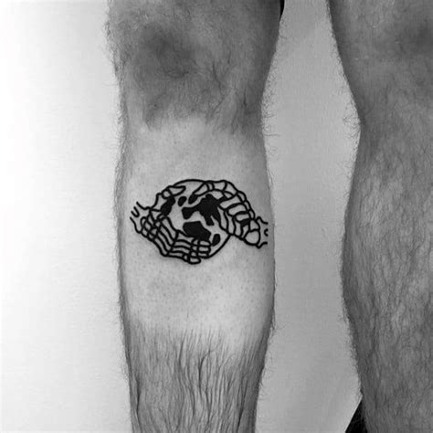 Skeleton Hands Holding Globe Mens Simple Leg Tattoos