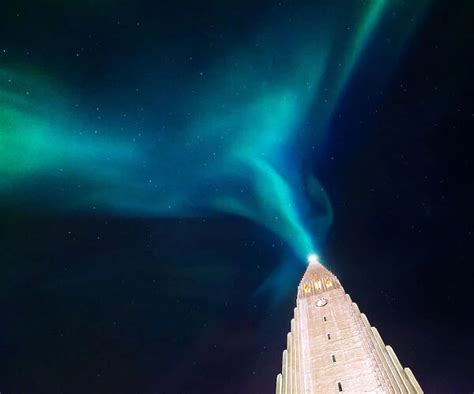 Aurora Borealis Display Over Famous Hallgrimskirkja Church Photos