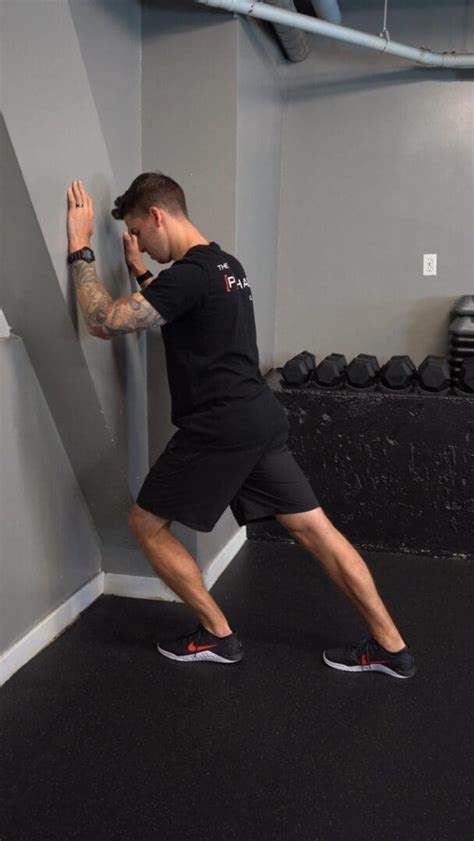 Wall Calf Stretch - Knee Straight, Dynamic - [P]rehab