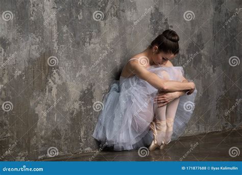 Woman In Ballet Costume Sitting In Closed Pose Stock Photo Image Of