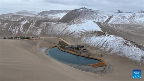 Snow Scenery Of Mingsha Mountain Crescent Spring Scenic Spot In