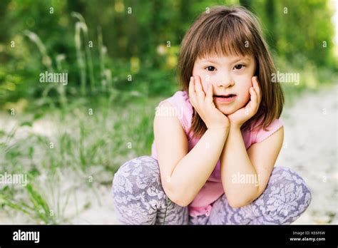 Portrait Of Young Girl With Down Syndrome Stock Photo Alamy