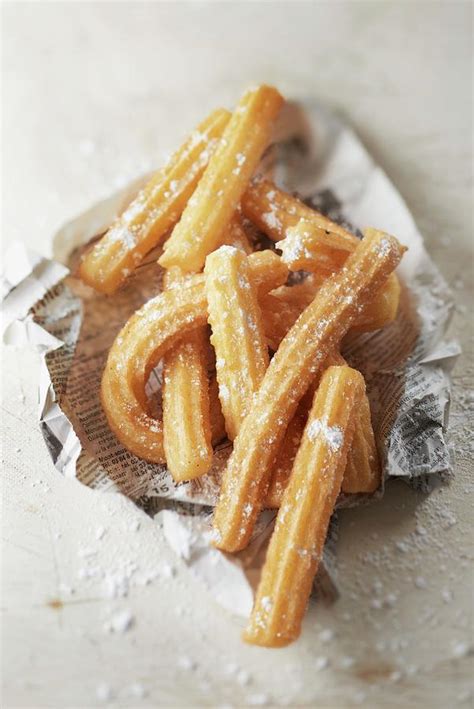 Churros In Newspaper Photograph By Barret Pixels