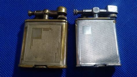 Two Vintage Polo Lift Arm Petrol Lighters Working Ebay