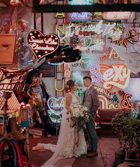 Gods Own Junkyard Wedding With Neon Signs & Lace Wedding Dress