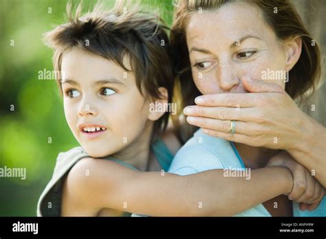 Mother Holding Hand Over Sons Mouth Hi Res Stock Photography And Images