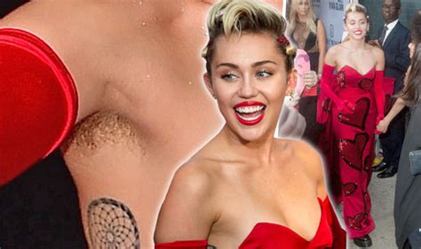 Miley Cyrus Flashes Her Hairy Armpits AGAIN As She Turns Heads In Bold