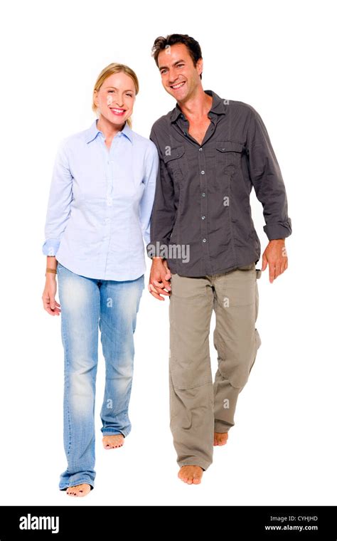 Couple Walking Hand In Hand Stock Photo Alamy