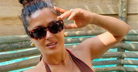 Salma Hayek Unleashes Cleavage As She Strips To Plunging Bikini For Dip