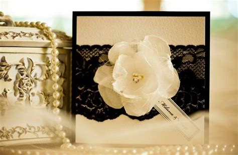 elegant wedding invitations with black lace applique and floral blooms