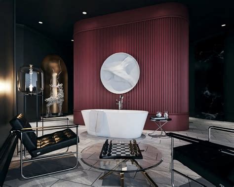 A White Bath Tub Sitting In A Bathroom Next To A Black Chair And Round