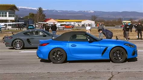 Watch Porsche Cayman With Flat Four Drag Race BMW Z4 With I6 Engine