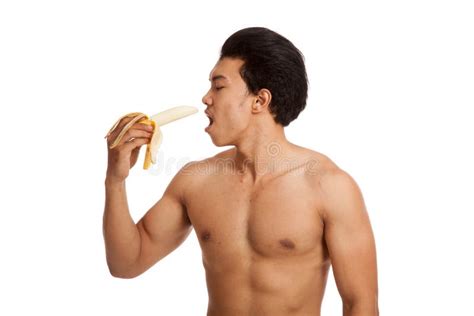 Muscular Asian Man Eat Banana Stock Photos Free And Royalty Free Stock