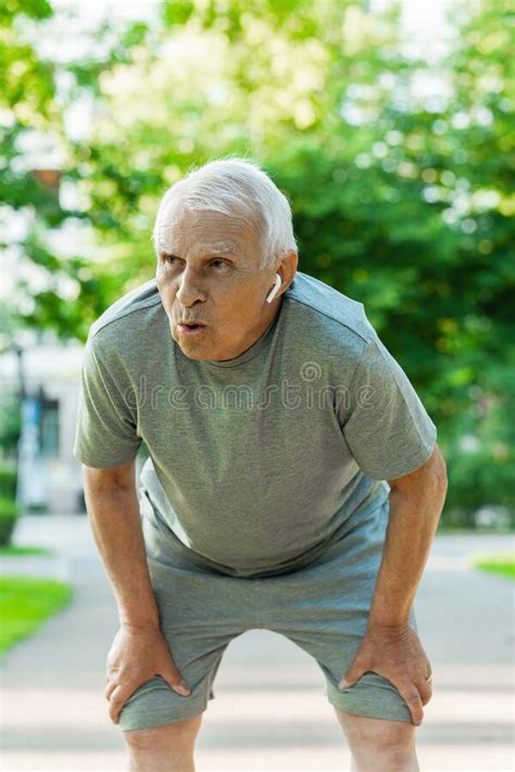 Exhausted Elderly Man Fall Asleep On Couch At Home Stock Image Image